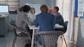 design team working together on prototypes, creative caucasian team engaging in collaborative design process, diverse caucasian team actively brainstorming and developing innovative prototypes - Powered by Shutterstock - Get 15% off with code: PIKWIZARD15