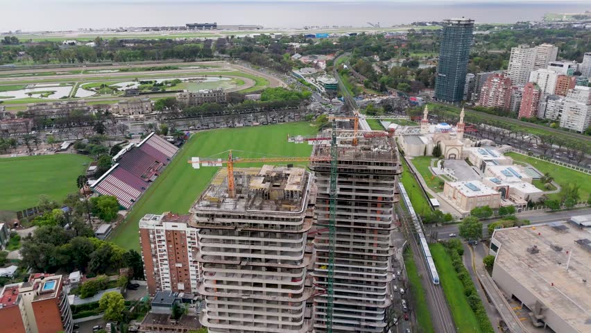 Aerial view of skyscrapers in Buenos Aires with lush greenery around