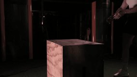 Fit, athletic woman performing explosive box jumps in a gym setting. - Powered by Shutterstock - Get 15% off with code: PIKWIZARD15