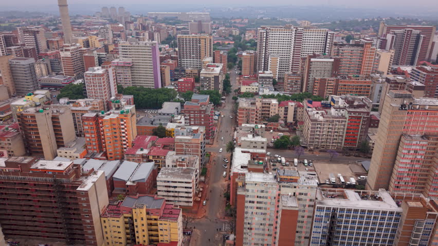 Drone shot of inner city buildings and apartment blocks in Hillbrow, Johannesburg, South Africa