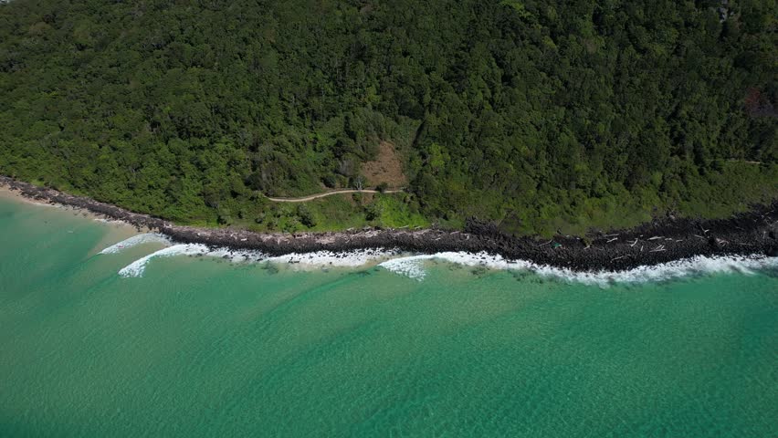 Rocky Shorelines With Calm Waves Over Burleigh Mountain On The Gold Coast, Queensland, Australia. Aerial Drone Shot