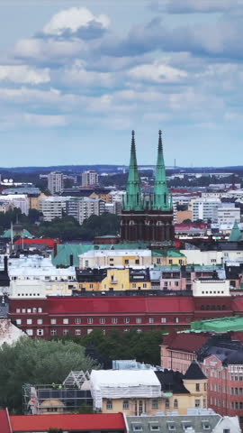 Aerial footage of old town with towers and tourist sights. Augmented reality with postal envelope logos. Helsinki, Finland