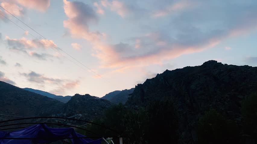 Sunrise timelapse over mountain landscape