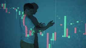 Man interacting with projected candlestick chart on wall, analyzing stock market fluctuations and financial data for trading strategies, investment planning, and business presentations, slow motion. - Powered by Shutterstock - Get 15% off with code: PIKWIZARD15