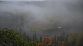 Scenic autumn river bend with misty forest view from Pahkanankallio in Finnish Lapland  - Powered by Shutterstock - Get 15% off with code: PIKWIZARD15
