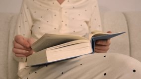 Woman Tracing Finger Across Book Page - Powered by Shutterstock - Get 15% off with code: PIKWIZARD15