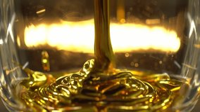 Dynamic close-up of rich golden liquid pouring into a clear glass, creating mesmerizing ripples. Ideal for food, beverage, or luxury product advertising. - Powered by Shutterstock - Get 15% off with code: PIKWIZARD15