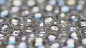 Elegant abstract background featuring sparkling crystal facets and shimmering light. Ideal for luxury, wedding, or festive event video projects and overlays. - Powered by Shutterstock - Get 15% off with code: PIKWIZARD15