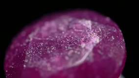 Dynamic macro video of a sparkling ruby gemstone, highlighting brilliant facets and deep red color. Ideal for luxury jewelry, science, and wealth concepts. - Powered by Shutterstock - Get 15% off with code: PIKWIZARD15