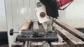 High Speed Rotation of Abrasive Grinding Disc on Metal Cut-Off Saw - Powered by Shutterstock - Get 15% off with code: PIKWIZARD15