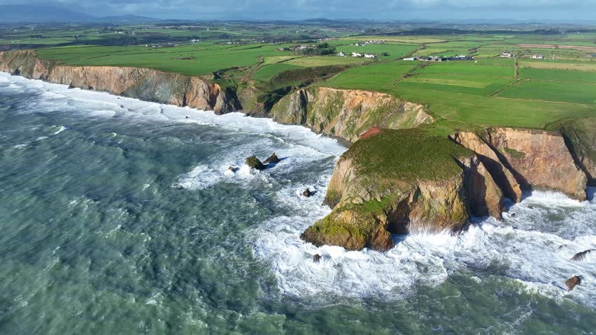 Ireland Epic Locations high dramatic seas batter the Waterford coastline causing coastal erosion autumn storm