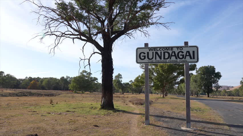 Wide shot of welcome to Gundagai signage, New South Wales, Australia
