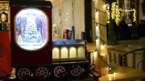 Festive Toy Train with Snow Globe and Holiday Lights - Powered by Shutterstock - Get 15% off with code: PIKWIZARD15