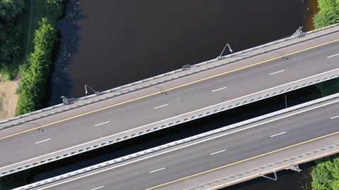 Aerial Highway Traffic on Bridge above River