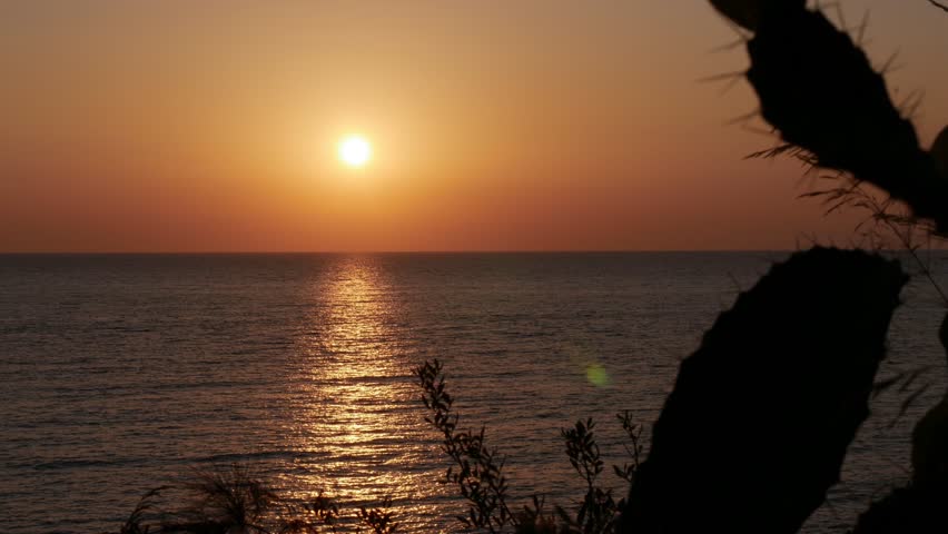 Beautiful Red Sunset on the Sea. Summer Tropical Sunset Sea View. Beautiful Seascape, Red Dusk on the Ocean.