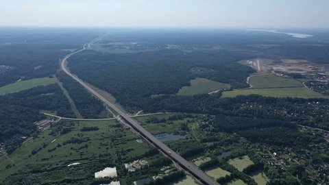Aerial View Long Highway through Forest Landscape