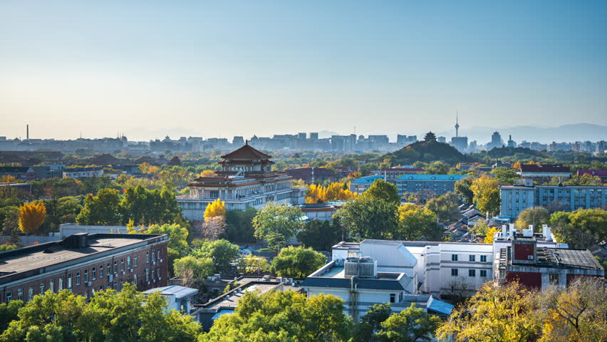 Time-lapse of Beijing, China in autumn, featuring traditional and modern architecture amidst forest landscapes