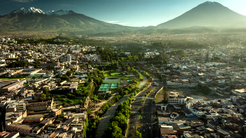 Arequipa UNESCO site historical center with traffic and river. Drone hyperlapse