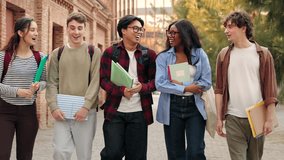 Group of University students talking and walking after classes on college campus  - Powered by Shutterstock - Get 15% off with code: PIKWIZARD15