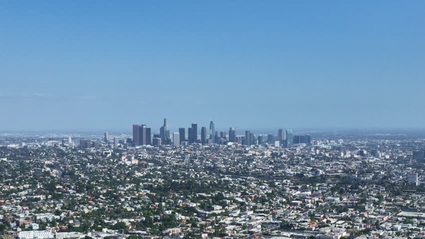 Los Angeles skyscrapers from sky. Los Angeles skyline from drone. Aerial Los Angeles city. Urban LA from drone angle. Aerial view over LA downtown.