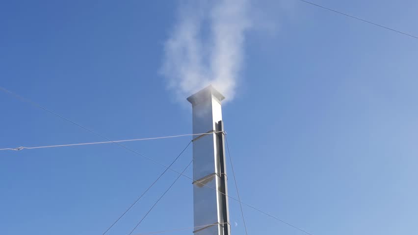 chimney, white smoke is coming from metal pipe slow motion

