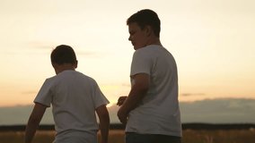 Child kid boys dancing sunset, children jumping up down, people outdoors having fun together, carefree summer sunset with two children, children facing the sunset on meadow, kids friendship framed by - Powered by Shutterstock - Get 15% off with code: PIKWIZARD15
