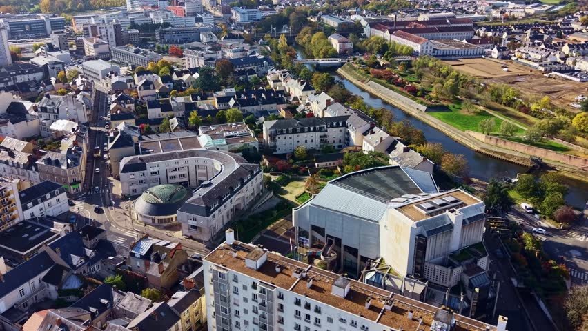 Palais des Congres et de la Culture du Mans and surrounding cityscape in Le Mans, France, for travel, architecture, and event content. Aerial drone forward