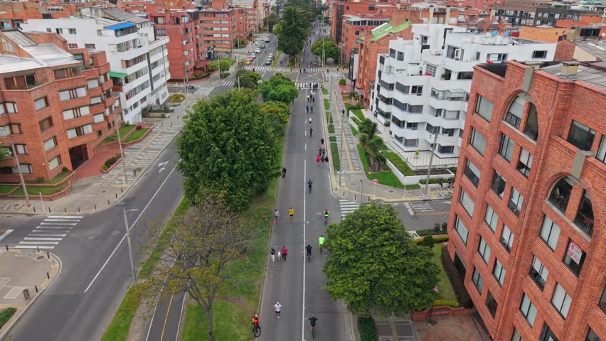 Aerial view of Ciclovía in Bogota with people biking on closed streets