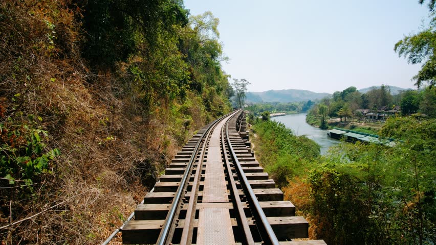 Train moving along the River Kwai death railway in Thailand, Kanchanaburi