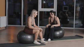 Engaging fitness session with stretching and balance exercises in a gym on a calm evening - Powered by Shutterstock - Get 15% off with code: PIKWIZARD15