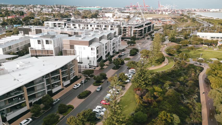 Cinematic aerial footage of North Fremantle in Perth, Western Australia. Clusters of condominium buildings line this peaceful and beautiful neighbourhood.