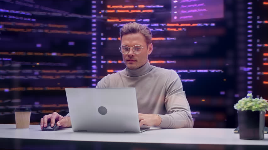 Cybersecurity Engineer Works on Laptop in Office, Surrounded by Code Screens, Detecting Intrusion, Analyzing Hacked System Logs, and Securing Compromised Network Data. 360 Degree Tracking Arc Shot - Powered by Shutterstock - Get 15% off with code: PIKWIZARD15