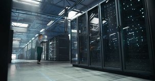 Asian and White It Engineers Walk Through a Vast Data Center, Analyzing Holographic Dashboards on Server Racks, Tracking Cloud Capacity, Managing Infrastructure, Secure Data Operations on Tablets. - Powered by Shutterstock - Get 15% off with code: PIKWIZARD15