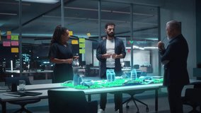 Diverse Team of Architects, Including a Black Woman, Middle Eastern Man, and Older White Man, Collaborates at 3d Smart City Model, Planning Sustainable Urban Design, Green Energy Infrastructure - Powered by Shutterstock - Get 15% off with code: PIKWIZARD15