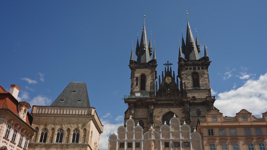 Iconic Tyn Church towers dominate Prague skyline.