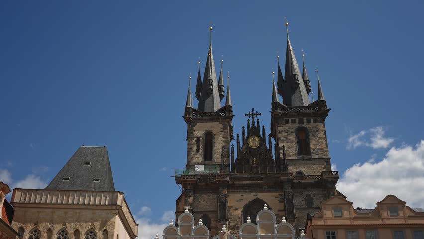 Iconic Tyn Church towers dominate Prague skyline.