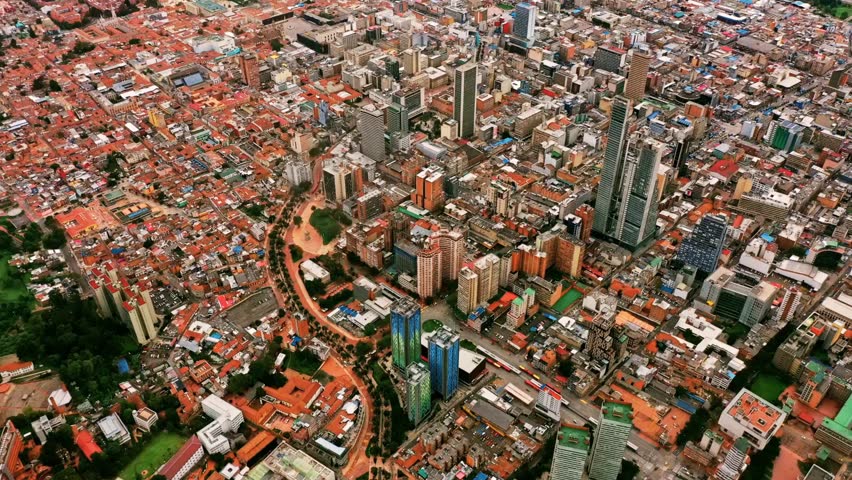 Panoramic view of El Poblado in Medellín, Colombia, showing modern skyscrapers, green hills, and the urban landscape of Antioquia’s most vibrant district.