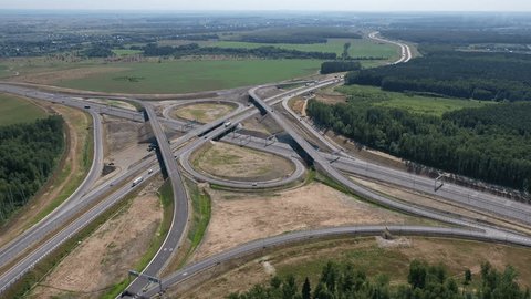 Drone Shot Highway Junction Amid Open Landscape