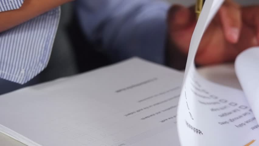 Close up of hand holding pen and checking financial list on work desk
Checking boxes with a pen on a white sheet of paper. Filling out the budget checklist. Calculate and fill in the shopping budget c - Powered by Shutterstock - Get 15% off with code: PIKWIZARD15