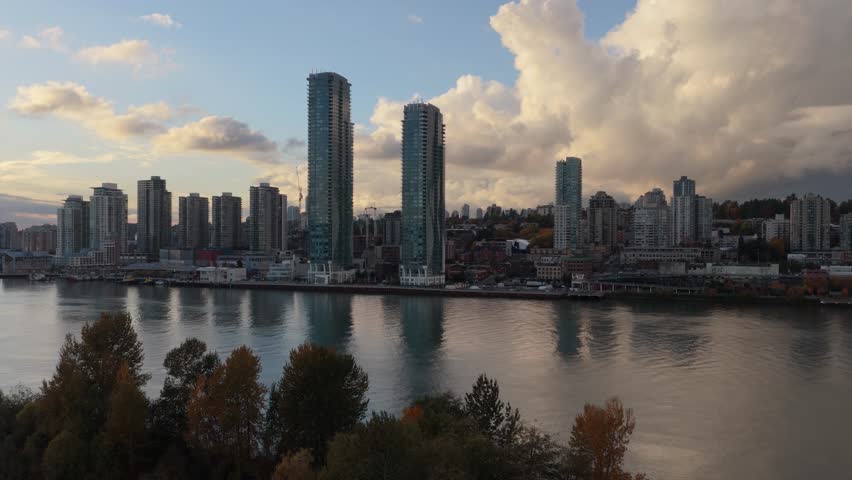 Aerial View of New Westminster City Skyline and Fraser River at Sunset in British Columbia, Canada