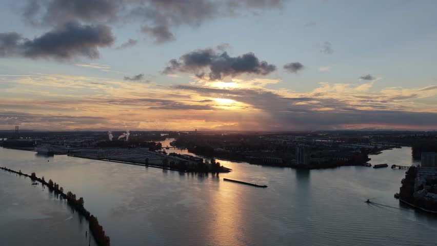 Aerial Sunset View Over Fraser River in New Westminster, British Columbia, Canada