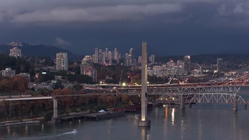 Stunning Aerial View of New Westminster Cityscape and Fraser River Bridges at Dusk in British Columbia, Canada