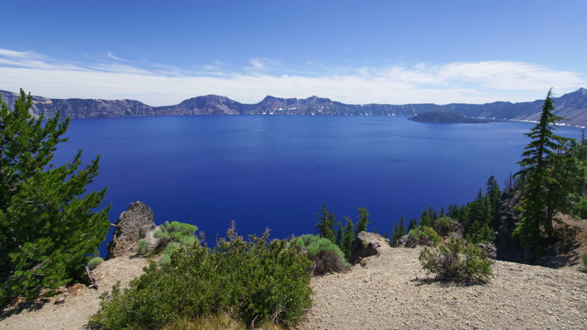 Crater Lake National Park and Wizard Island from Cleetwood Cove Trail Time Lapse Tilt Up Oregon USA