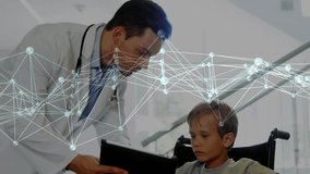 Doctor leaning forward presenting tablet to child in wheelchair, sharing medical network overlay. Physician, patient, screen, graph, atrium, glass, engagement - Powered by Shutterstock - Get 15% off with code: PIKWIZARD15