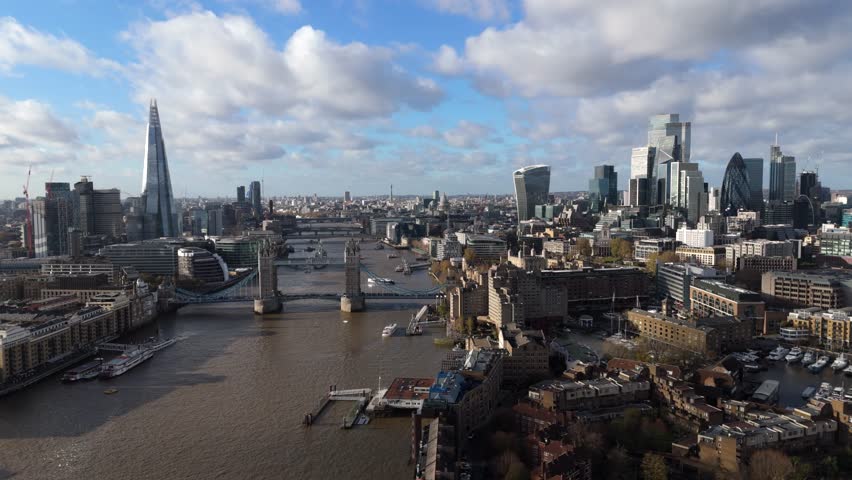 Aerial view of London featuring the River Thames, Tower Bridge and city skyline