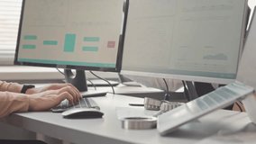 A construction technology engineer creates a precise digital mechanism scheme on a modern workstation.
 - Powered by Shutterstock - Get 15% off with code: PIKWIZARD15