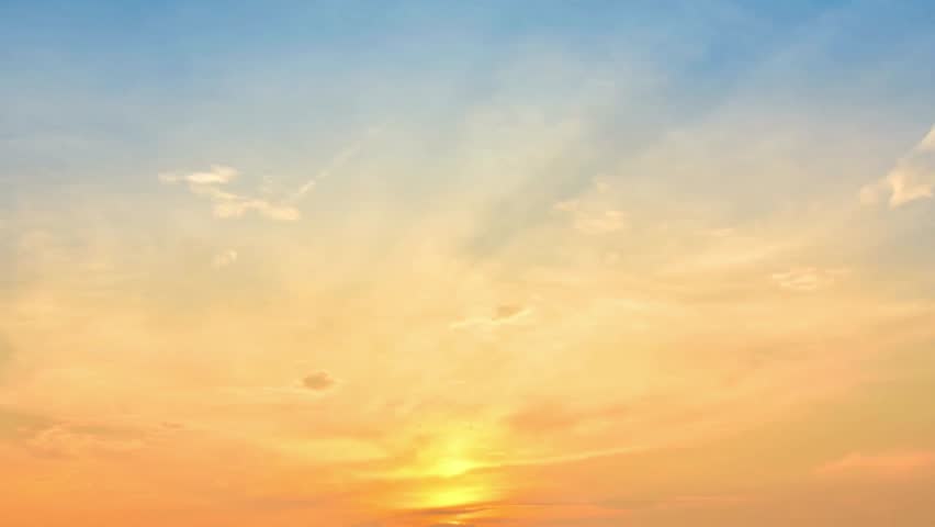 Dramatic sunset sky with vibrant colors creating a peaceful and inspiring scene