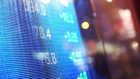 Stock market data displayed on an electronic screen showing financial information - Powered by Shutterstock - Get 15% off with code: PIKWIZARD15