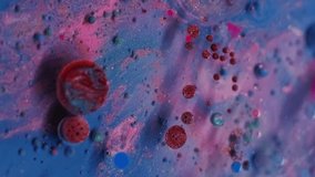 Fluid drop. Liquid background. Blur blue red maroon color ink in acrylic marble water round texture flowing on creative art abstraction. - Powered by Shutterstock - Get 15% off with code: PIKWIZARD15