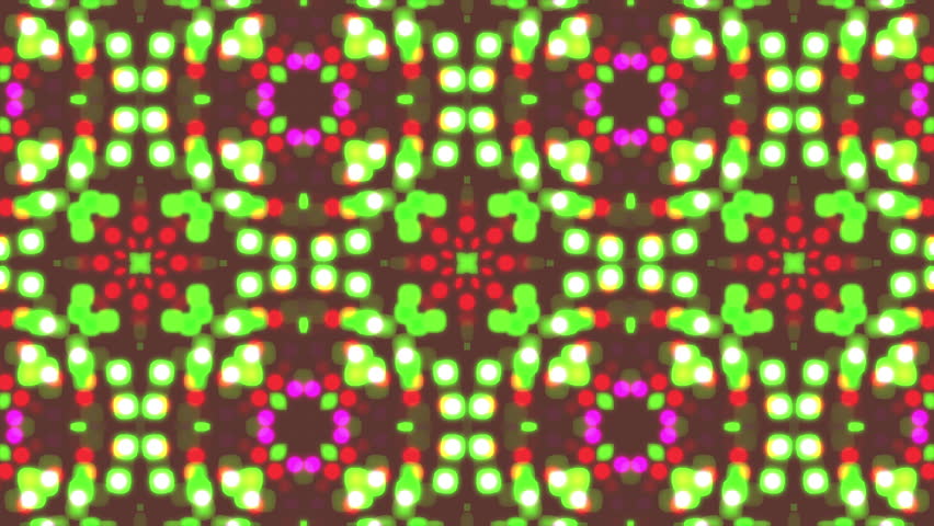Symmetrical kaleidoscope-style animation with green, pink, and red glowing patterns.